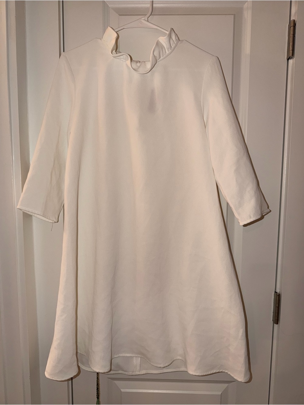 Pomander Place Cream Ruffle-Neck Mini Dress